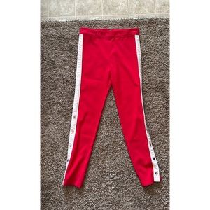 Skinny leg, red tear away pants